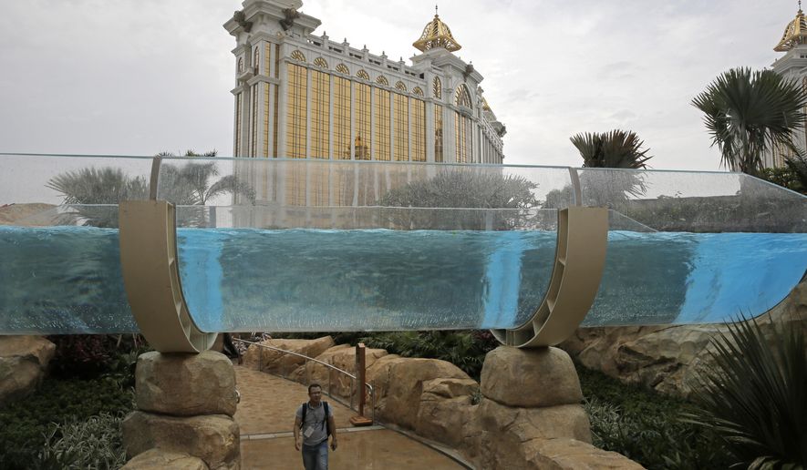 A man walks through the new expansion of the Galaxy Macau casino resort in Macau, Tuesday, May 26, 2015. Macau, the world’s casino capital, is launching a new wave of resort expansion this week with the first of more than $20 billion in projects to open on the up-and-coming Cotai Peninsula over the next two years. (AP Photo/Vincent Yu)