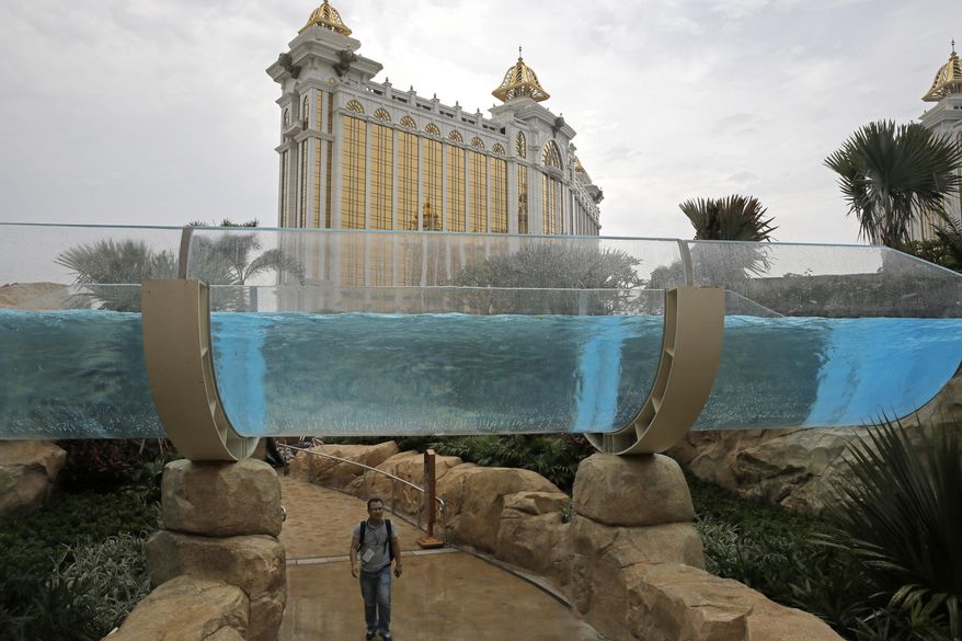 A man walks through the new expansion of the Galaxy Macau casino resort in Macau, Tuesday, May 26, 2015. Macau, the world’s casino capital, is launching a new wave of resort expansion this week with the first of more than $20 billion in projects to open on the up-and-coming Cotai Peninsula over the next two years. (AP Photo/Vincent Yu)