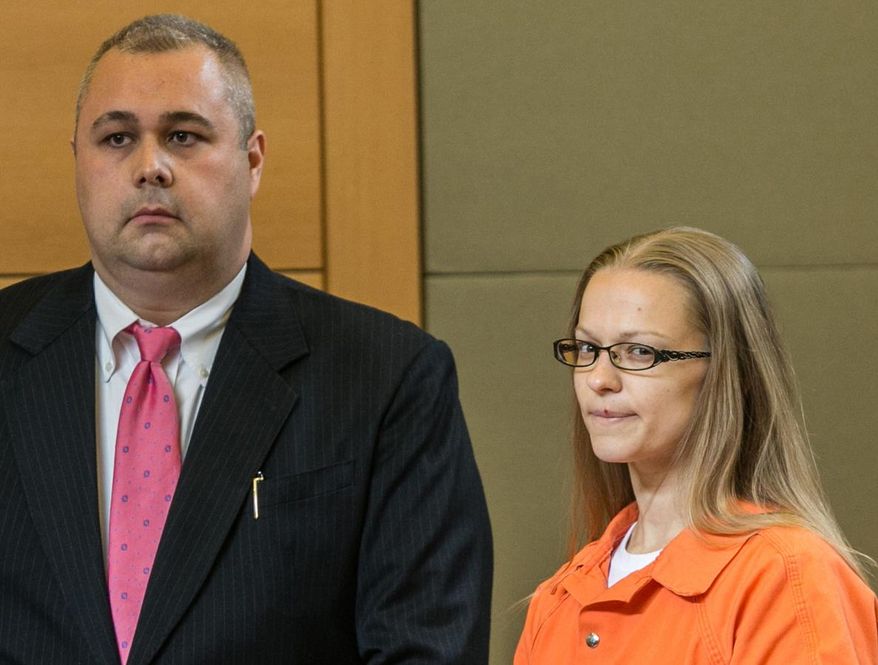 FILE - In a Wednesday, May 13, 2015 photo, Angelika Graswald, right, stands in court with Michael Archer a forensic scientist, as her attorneys ask for bail and to unseal the indictment against her during a hearing, in Goshen, N.Y. Prosecutors said Tuesday, May 26, 2015, that the body of missing kayaker Vincent Viafore was found Saturday, May 23, 2015, three weeks after his fiancee, Graswald, was charged with killing him by tampering with his boat on an outing to a scenic island in the Hudson River, N.Y. (Allyse Pulliam/Times Herald-Record via AP, Pool, File)