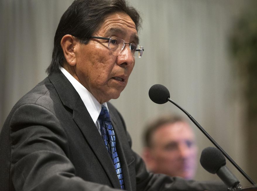 Hopi Chairman Herman Honanie speaks during a news conference on the Paris auctions selling Hopi sacred objects,Wednesday, May 27, 2015 at the Heard Museum in Phoenix. Hopi tribal leaders and Arizona’s members of Congress are asking U.S. law enforcement to stop the sale of about a dozen sacred Hopi artifacts at a Paris auction house in June. (Mark Henle/The Arizona Republic via AP) MARICOPA COUNTY OUT; MAGS OUT; NO SALES; MANDATORY CREDIT