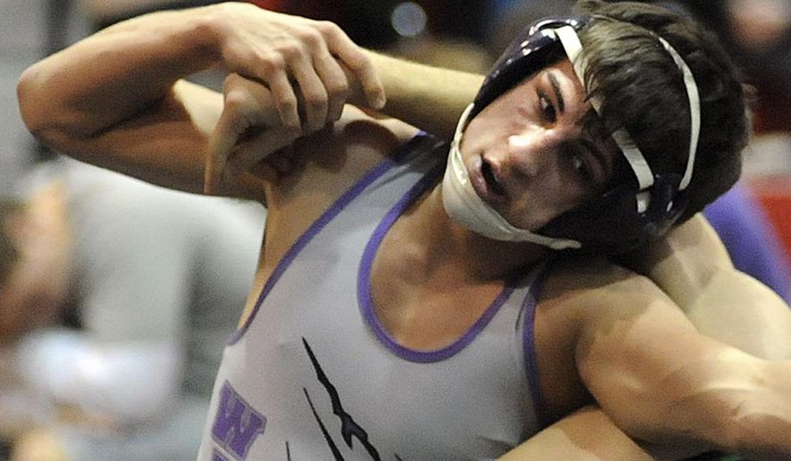 FILE-This Jan. 16, 2014 file photo shows Keystone High School wrestler Logan Stiner during a match in Sheffield Village, Ohio. A measure barring the sale of pure caffeine products has cleared the Ohio House after representatives moved to also prohibit the sale of powdered or crystalline alcohol. The House passed the legislation on a 92-3 vote Wednesday, May 27, 2015 which was the anniversary of an Ohio teen's death from caffeine powder. Eighteen-year-old Stiner died days before his high school graduation after consuming a lethal dose of the powdery substance. (Steve Manheim, The Chronicle Telegram via AP, File)