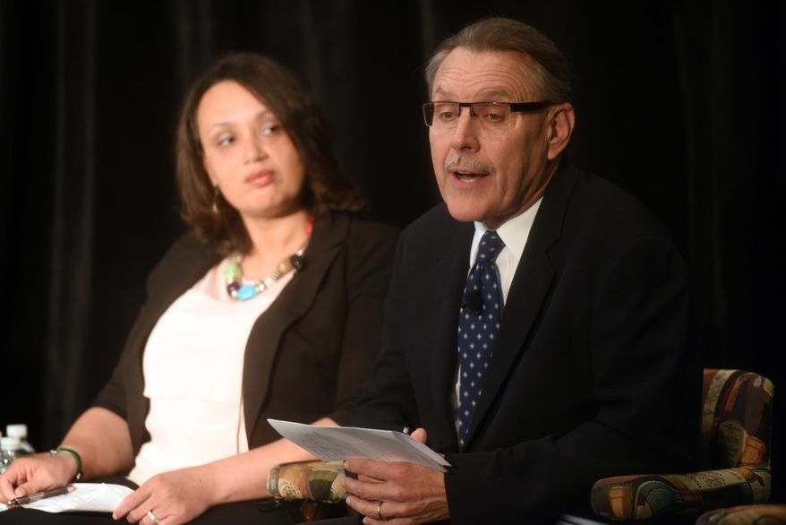Tonya Allen, left, president and CEO of The Skillman Foundation, and John Rakolta Jr., CEO of Walbridge speak on Detroit's education struggles at the Mackinac Policy Conference, Wednesday, May 27, 2015 on Mackinac Island, Mich. Prominent Detroit-area business and community leaders say the Republican-led Legislature has no excuse to ignore Detroit Public School's debt because the state ultimately is constitutionally responsible for it. (Tanya Moutzalias/The Ann Arbor News via AP) LOCAL TELEVISION OUT; LOCAL INTERNET OUT