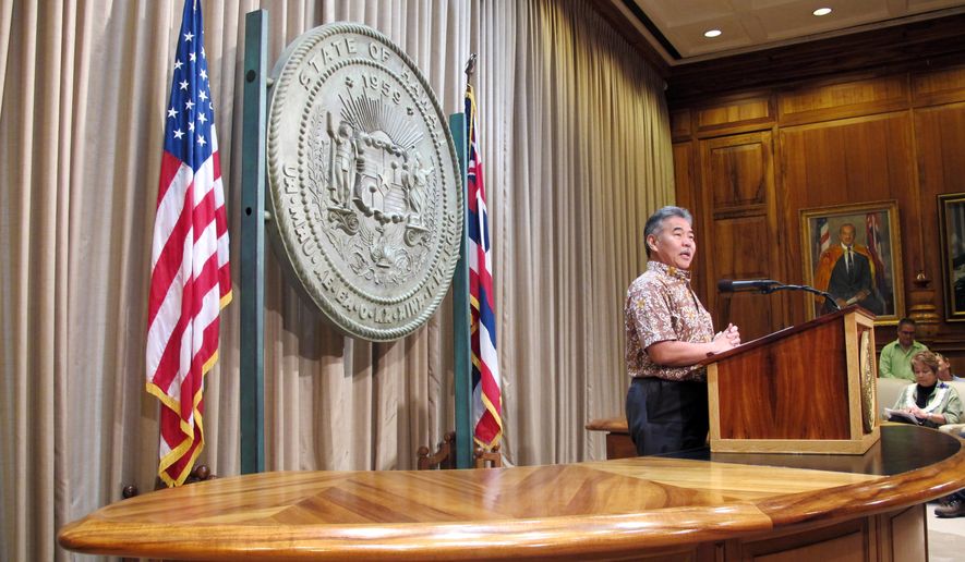 Hawaii Gov. David Ige speaks to members of the media in Honolulu on Tuesday, May 26, 2015, about the project to build a giant telescope on Mauna Kea. The project to build a giant telescope near the summit of Mauna Kea has the right to move forward, but Hawaii has failed the mountain in many ways, Ige said Tuesday. (AP Photo/Jennifer Sinco Kelleher)
