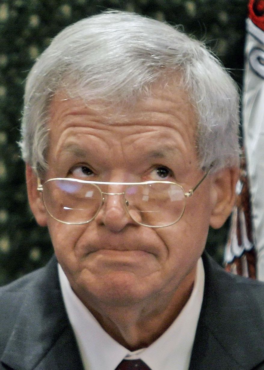 FILE - In this March, 5, 2008 file photo, former U.S. House Speaker Dennis Hastert is overcome with emotion while visiting the Illinois House of Representatives floor at the Illinois State Capitol in Springfield, Ill. Federal prosecutors indicted Hastert, 73, Thursday, May 28, 2015, on bank-related charges. (AP Photo/Seth Perlman, File)