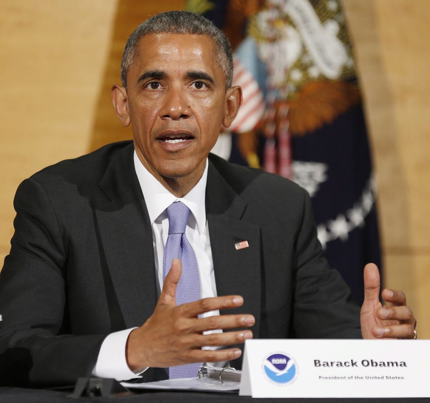 President Obama speaks after receiving a briefing at the National Hurricane Center in Miami on Thursday to draw attention to preparedness in advance of the annual storm season that formally begins June 1. Mr. Obama linked hurricanes to climate change. (Associated Press)