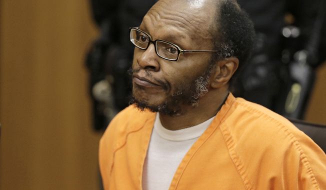 ADVANCE FOR USE MONDAY, JUNE 1, 2014 AND THEREAFTER - Dwayne Wilson attends his sentencing hearing in Cleveland on Wednesday, April 1, 2015. Tests linked his DNA to evidence found in a backlog of untested rape kits. Last winter, he was found guilty of raping four women in the 1990s. He has been sentenced to 110 years in prison. (AP Photo/Tony Dejak)