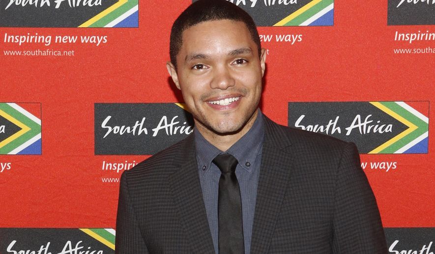 FILE - In this April 13, 2015 file photo, Trevor Noah, South African comedian and new host of "The Daily Show" on Comedy Central, poses at South African Tourism's sixth annual Ubuntu Awards, at the American Museum of Natural History in New York. Comedy Central says Sept. 28, 2015 will be opening night for Noah, when the 31-year-old will be stepping into the job held by Jon Stewart since 1999. (Jason DeCrow/South African Tourism via AP)