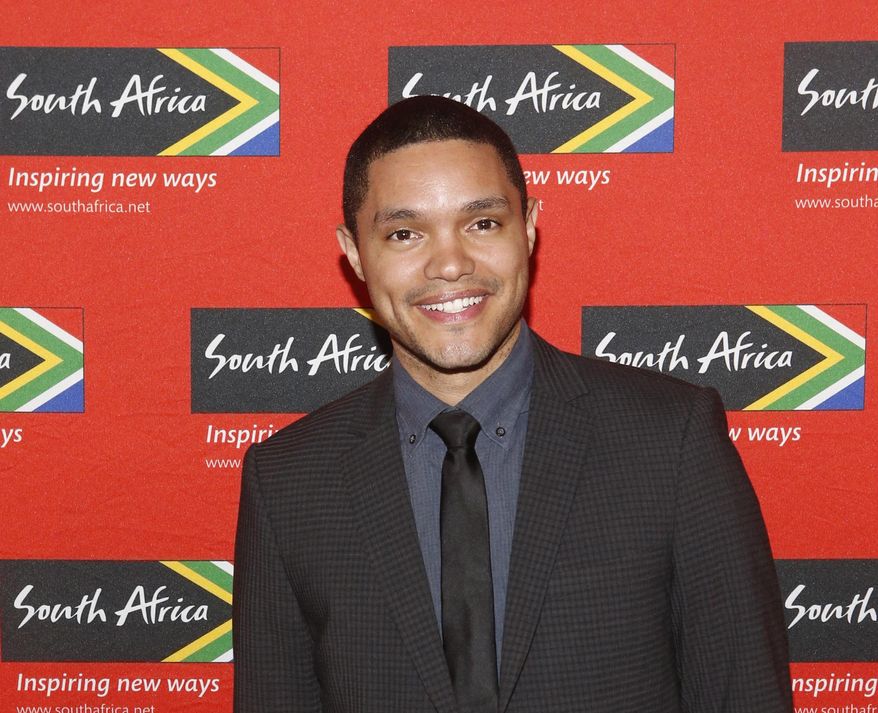 FILE - In this April 13, 2015 file photo, Trevor Noah, South African comedian and new host of "The Daily Show" on Comedy Central, poses at South African Tourism's sixth annual Ubuntu Awards, at the American Museum of Natural History in New York. Comedy Central says Sept. 28, 2015 will be opening night for Noah, when the 31-year-old will be stepping into the job held by Jon Stewart since 1999. (Jason DeCrow/South African Tourism via AP)