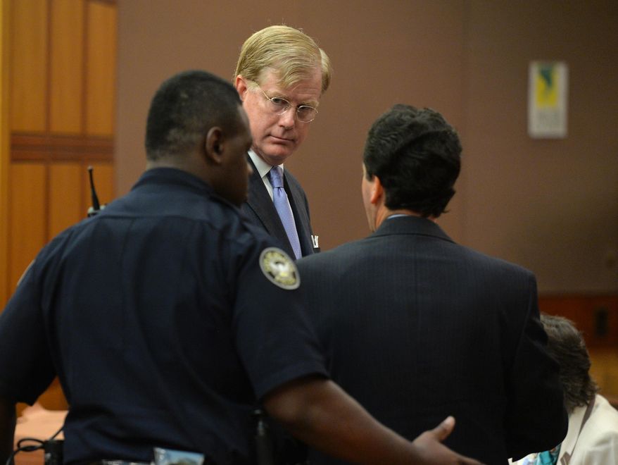 FIle-- In this Sept. 5, 2014 file photo U.S. District Court Judge Mark Fuller appears in Fulton County Court Friday, Sept. 5, 2014 to face charges of misdemeanor battery, in Atlanta. Fuller will resign effective Aug. 1. His attorney, Barry Ragsdale, confirmed the resignation Friday. Fuller was arrested last year after assaulting his wife at a hotel in Atlanta. (Brant Sanderlin/Atlanta Journal-Constitution via AP) MARIETTA DAILY OUT; GWINNETT DAILY POST OUT; LOCAL TELEVISION OUT; WXIA-TV OUT; WGCL-TV OUT