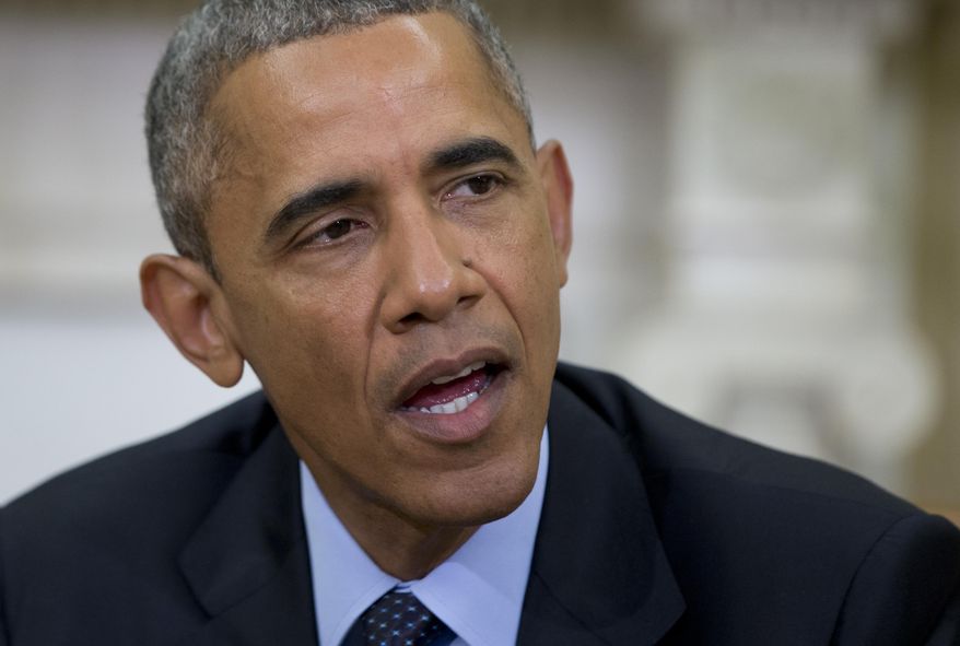 President Barack Obama speaks to media as he meets with Attorney General Loretta Lynch in the Oval Office of the White House in Washington, Friday, May 29, 2015. The president said a "handful of senators" are the only thing standing in the way of an extension of key Patriot Act provisions before they expire at midnight Sunday. (AP Photo/Carolyn Kaster)