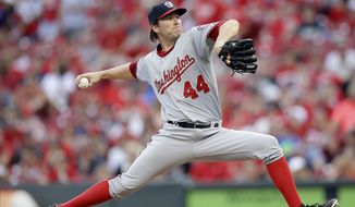Washington Nationals relief pitcher Casey Janssen throws in the eighth inning of a baseball game against the Washington Nationals, Saturday, May 30, 2015, in Cincinnati. The Reds won 8-5. (AP Photo/John Minchillo)