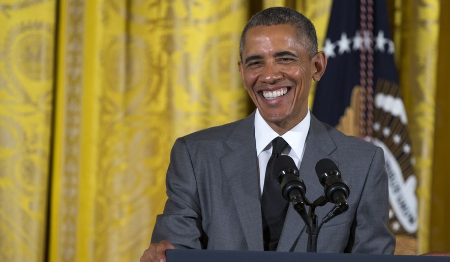 President Barack Obama smiles during an event with Young Southeast Asian Leaders Initiative fellows, Monday, June 1, 2015, in the East Room of the White House in Washington. (AP Photo/Evan Vucci)