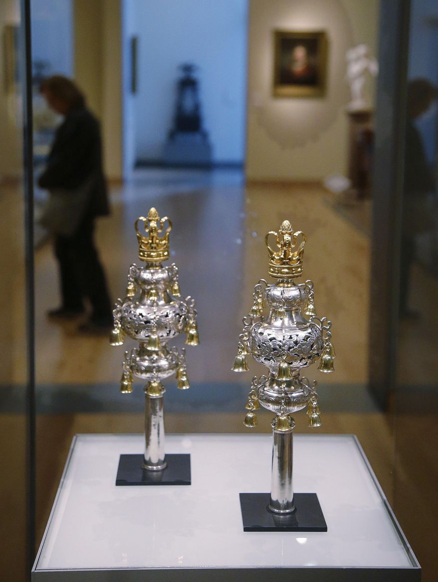 Ceremonial bells belonging to the 250-year-old Touro Synagogue in Newport, R.I., and worth more than $7 million are seen on display at the Museum of Fine Arts in Boston, Monday, June 1, 2015. The fate of the bells and the nation's oldest synagogue to which they belong is in the hands of a Rhode Island court which will decide on a dispute between the congregation that currently worships at the Touro Synagogue and the nation's first Jewish congregation, Shearith Israel, of New York. The disagreement began over the proposed sale to a museum of ceremonial bells for $7.4 million and has become a bitter dispute over who is in charge of the 250-year-old Touro Synagogue in Newport. (AP Photo/Stephan Savoia)