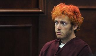 In this July 23, 2012, file photo, James Holmes, who is charged with killing 12 moviegoers and wounding 70 more in a shooting spree in a crowded theatre in Aurora, Colo., in July 2012, sits in Arapahoe County District Court in Centennial, Colo. (RJ Sangosti, Denver Post via AP, Pool, File)