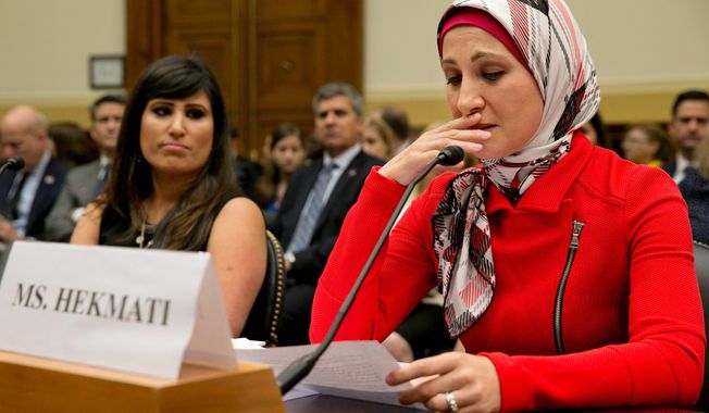 Sarah Hekmati (right), whose brother Amir Hekmati has been detained in Iran, speaks to Congress about her family. She is accompanied by Naghmeh Abedini (left), wife of detained U.S. citizen Saeed Abedini. (Associated Press)