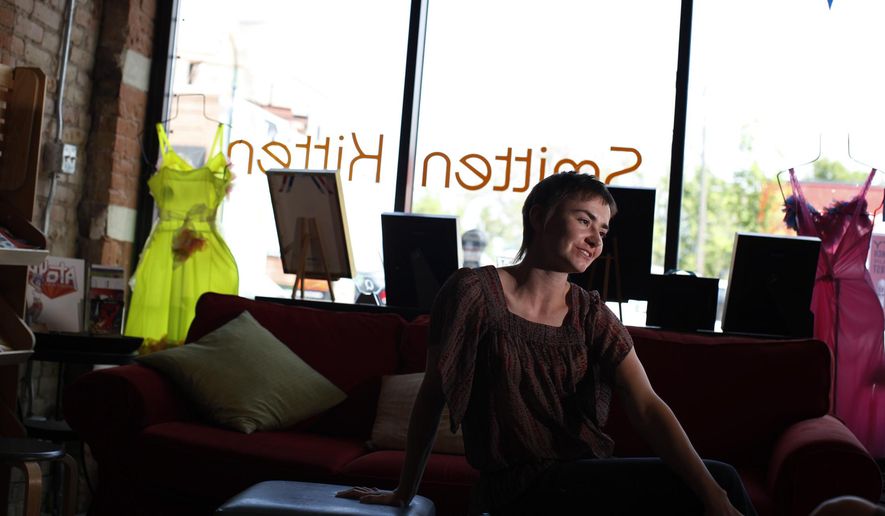 In this May 18, 2010 photo, adult novelty store Smitten Kitten owner Jennifer Pritchett poses for a photo, in Minneapolis. A sex education teacher has drawn the ire of parents after taking middle- and high-school students on a field trip to the store. Pritchett said the store is an educational resource about sex and sexuality. “We leave it up to the discretion of parents and guardians as to when, if, and in what capacity they seek resources from our educators,” she said. (Jerry Holt/Star Tribune via AP)