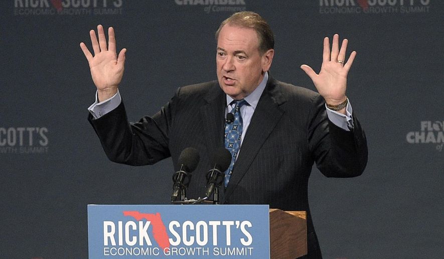 Republican presidential candidate and former Arkansas Gov. Mike Huckabee addresses attendees during Rick Scott&#39;s Economic Growth Summit in Lake Buena Vista, Fla., on June 2, 2015. (Associated Press)