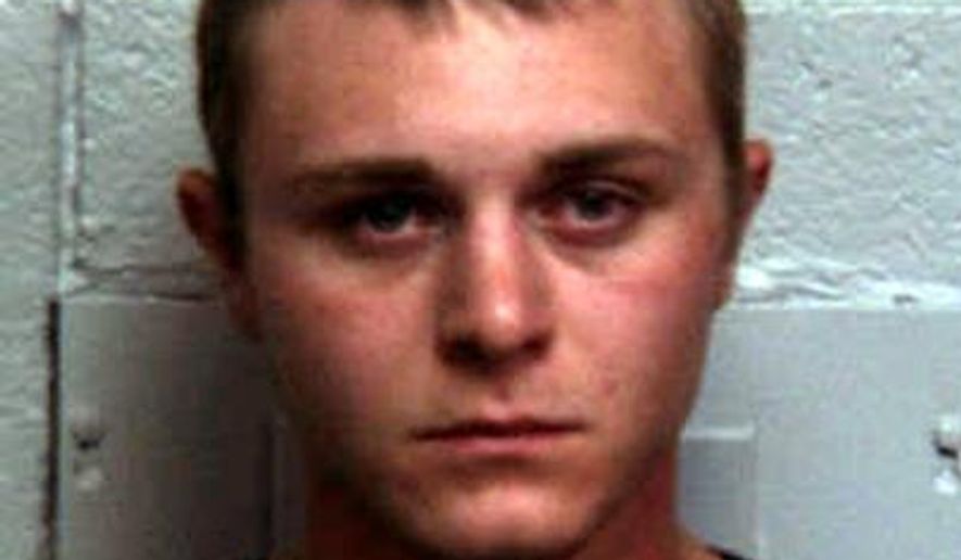 This is an undated mugshot provided by the Somerset, Pa., County Jail of Logan Shaulis, of Somerset, Pa. Police say Shaulis set up a drunken-driving checkpoint early Saturday morning, May 30, 2015, compete with road flares, while pretending to be a Pennsylvania state trooper. He faces charges including drunken driving, impersonating a public servant and unlawful restraint. (Somerset County Jail via AP)