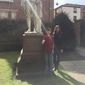 Jessica and her brother in front of the statue of William Wilberforce in the home that Wilberforce grew up in at Hull, England where Jessica did some of her research.
