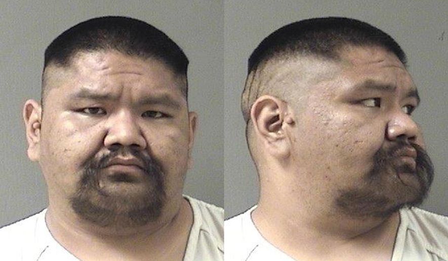 This undated law enforcement booking photo from the Yellowstone County, Mont., Sheriff&#x27;s Office shows Garrett Sidney Henderson Wadda. Prosecutors are seeking 15 years in prison for Wadda, who admitted to dumping the body of a 21-year-old woman murdered on Montana’s Northern Cheyenne Indian Reservation. Wadda faces sentencing Thursday, June 4, 2015, after pleading guilty to being an accessory for moving the body of Hanna Harris after her July, 2013 death. Murder and aggravated sexual abuse charges would be dismissed under a plea deal.(Yellowstone County Sheriff&#x27;s Office via AP)