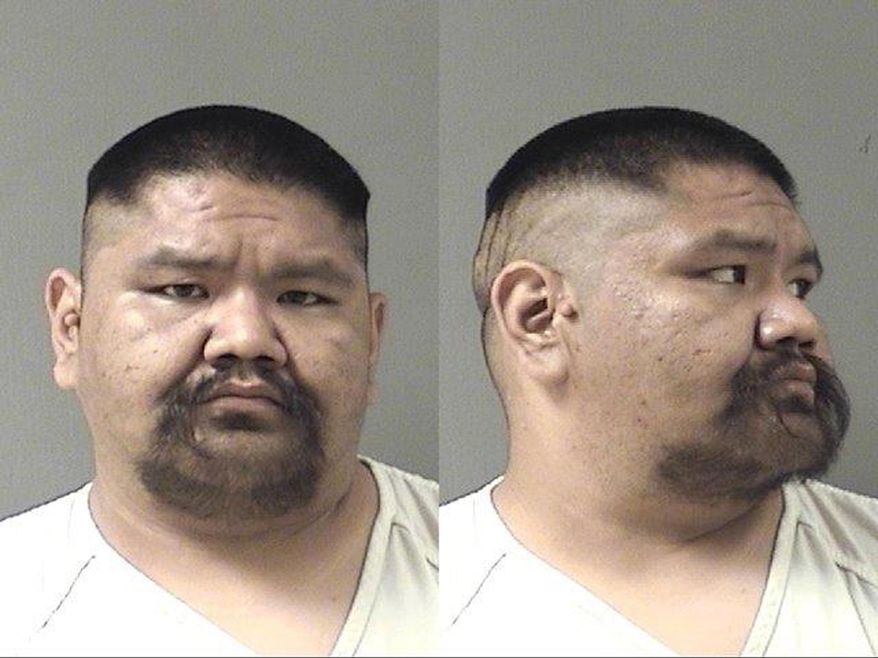 This undated law enforcement booking photo from the Yellowstone County, Mont., Sheriff's Office shows Garrett Sidney Henderson Wadda. Prosecutors are seeking 15 years in prison for Wadda, who admitted to dumping the body of a 21-year-old woman murdered on Montana’s Northern Cheyenne Indian Reservation. Wadda faces sentencing Thursday, June 4, 2015, after pleading guilty to being an accessory for moving the body of Hanna Harris after her July, 2013 death. Murder and aggravated sexual abuse charges would be dismissed under a plea deal.(Yellowstone County Sheriff's Office via AP)