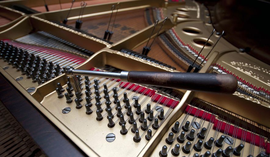In this May 27, 2015, photo, a tool used by piano tuner Roy West, 81, is shown at the Kluttz Piano Co. in Salisbury, N.C. (Jon C. Lakey/The Salisbury Post via AP)