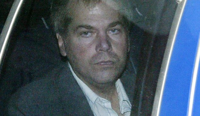 FILE-In this Nov. 18, 2003 file photo, John Hinckley Jr. arrives at U.S. District Court in Washington. Hinckley Jr. is currently awaiting a decision from a federal judge in Washington about whether he will be allowed to live full-time outside a mental hospital where he has been since being found not guilty by reason of insanity in the 1981 shooting that wounded Reagan and three others. (AP Photo/Evan Vucci, File)