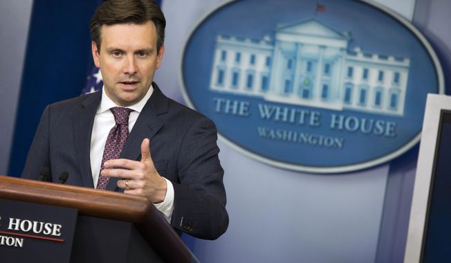 White House press secretary Josh Earnest speaks about the Chinese hack of the computer system of the Office of Personnel Management, Friday, June 5, 2015, during the daily press briefing at the White House in Washington. (AP Photo/Evan Vucci)