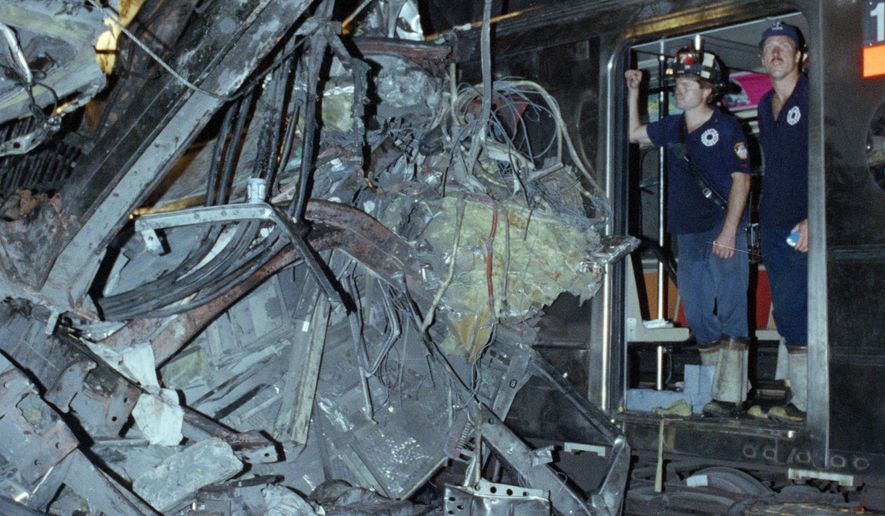 FILE - In this Aug. 28, 1991, file photo, firemen look at the twisted remains of a downtown Lexington Avenue 4 subway train after its derailment at Union Square in New York. Far removed from an era when New Yorkers knew him as the drunken motorman in a nightmarish subway crash, Robert Ray once again found himself in a miserable situation. This time, Ray was the victim, mowed down by a hit-and-run driver as he tried to cross a busy thoroughfare in the Bronx on May 28, 2015. (AP Photo/File)