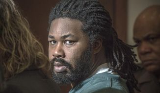 Jesse Matthew Jr. looks toward the gallery while appearing in court in Fairfax, Va., in this Nov. 14, 2014, file photo. (AP Photo/The Washington Post, Bill O&#39;Leary, Pool, File)