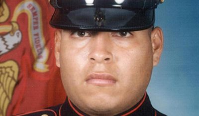 This file photo shows Sgt. Rafael Peralta. The Navy will posthumously award a Navy Cross to the Marine killed in Iraq, after years of appeals by his family asking the Pentagon to approve the Marine Corps’ nomination for the Medal of Honor, the nation’s highest award for military heroism. The family of Sgt. Peralta will accept the nation’s second-highest award at a ceremony Monday, June 8, 2015, at Camp Pendleton, north of San Diego. (AP Photo/File)