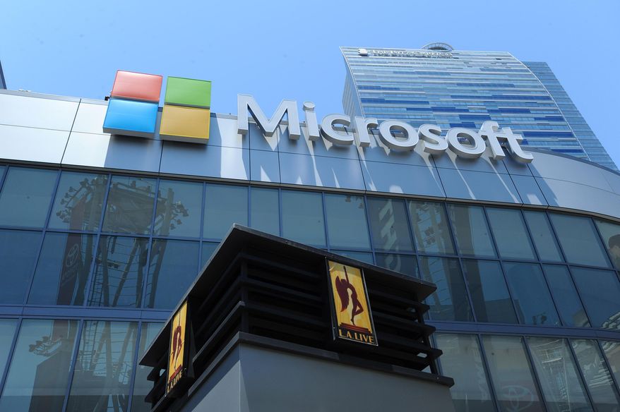 This Sunday, June 7, 2015 photo provided by courtesy of Microsoft Theater/AEG shows the new Microsoft Theatre sign installation at Nokia Theatre in Los Angeles. Los Angeles' Nokia Theatre will now be known as the Microsoft Theater. Microsoft and theater owner AEG announced Tuesday, June 9, 2015, that the 7,100-seat venue is being rebranded following Microsoft's acquisition of the Nokia smartphone business last year. (Courtesy Microsoft Theater/AEG via AP)