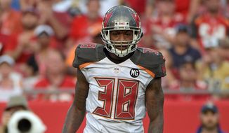 Tampa Bay Buccaneers free safety Dashon Goldson (38) waits for a play during the second half of an NFL football game against the St. Louis Rams in Tampa, Fla., Sunday, Sept. 14, 2014.(AP Photo/Phelan M. Ebenhack)