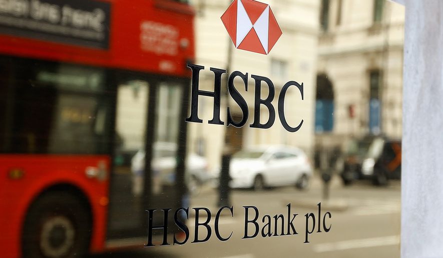 HSBC Holdings, Britain&#x27;s largest bank by market value, will cut between 22,000 and 25,000 jobs around the world in an attempt to reduce costs and shift its centre of gravity back towards fast-growing Asian economies. (Associated Press)