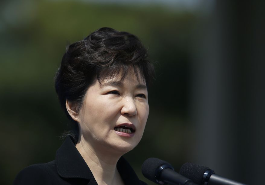 South Korean President Park Geun-hye delivers a speech during a ceremony marking Memorial Day at the National Cemetery in Seoul, South Korea, Saturday, June 6, 2015. South Korea marked the 60th anniversary of Memorial Day for those killed in the 1950-53 Korean War. (Kim Hong-Ji/Pool Photo via AP)