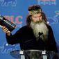Duck Dynasty&quot; patriarch Phil Robertson will receive the &quot;Andrew Breitbart Defender of the First Amendment Award&quot; at the Conservative Political Action Conference Friday. (Associated Press photographs)