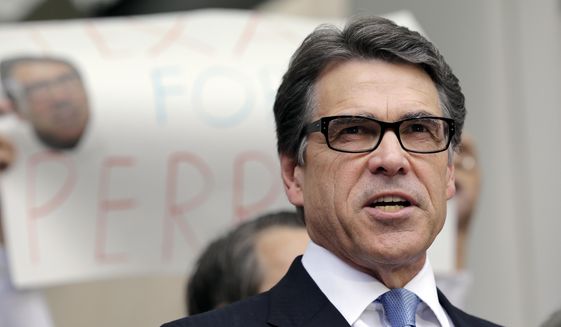 File - In this Aug. 19, 2014 file photo,Texas Gov. Rick Perry talks to the media and supporters after he was booked and released at the Blackwell Thurman Criminal Justice Center, in Austin, Texas. Austin has made itself a painful exception to Republican rule in Texas. The big college town is home to the grand jury that indicted Perry while he was in office and to judges who authorized a gay wedding and struck down abortion restrictions and GOP cuts to public schools. Republican Gov. Greg Abbott this month is signing laws that will draw power away from solidly Democratic Travis County and weaken its local jurisdiction over state business done inside its borders. (AP Photo/Eric Gay, File)