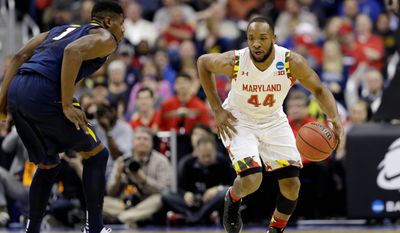 Guard Dez Wells, who played his final three collegiate seasons at Maryland, made the 25-minute drive to the Verizon Center to  work out for the Wizards on Thursday. (Associated Press)