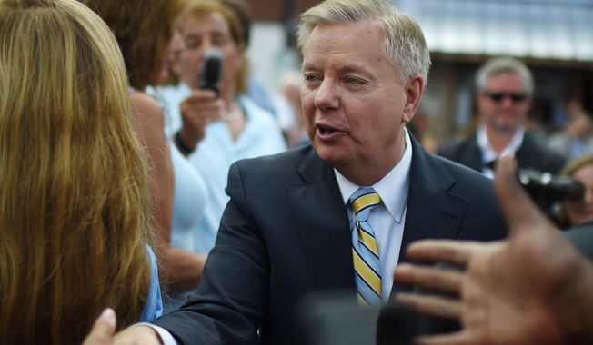 Sen. Lindsey Graham, South Carolina Republican and presidential hopeful, greets supporters in Central, S.C., on June 1, 2015. (Associated Press) **FILE**