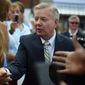 Sen. Lindsey Graham, South Carolina Republican and presidential hopeful, greets supporters in Central, S.C., on June 1, 2015. (Associated Press) **FILE**