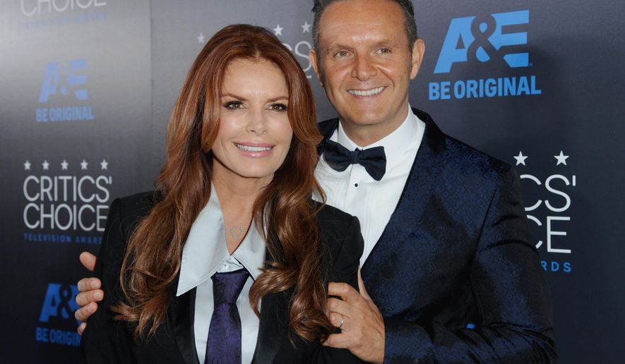 FILE - In this May 31, 2015 file photo, Roma Downey, left, and Mark Burnett arrive at the Critics&#39; Choice Television Awards in Beverly Hills, Calif. The TLC network said Thursday, June 11, that it will air their new series, &quot;Answered Prayers,&quot; starting next month. It will feature stories of people in life-threatening situations who have experienced moments they regard as divine intervention. (Photo by Richard Shotwell/Invision/AP, File)