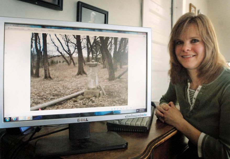 Jenny Yates is photographed on Dec. 14, 2014 in Madelia, Minn. Yates has tried since 2011 to restore an abandoned pioneer cemetery a few miles otuside of town. A private landowner is unwilling to allow groups or heavy machinery to cross his land. (John Cross/The Free Press via AP)