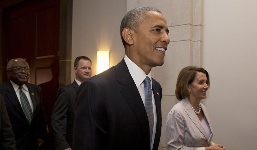 President Barack Obama, House Minority Leader Nancy Pelosi of Calif. and House Minority Assistant Leader James Clyburn of S.C., leave meeting with House Democrats on Capitol Hill in Washington, Friday, June 12, 2015. The president made an 11th-hour appeal to dubious Democrats on Friday in a tense run-up to a House showdown on legislation to strengthen his hand in global trade talks (AP Photo/Carolyn Kaster)