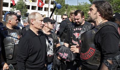 Russian President Vladimir Putin has allied himself with Alexander Zaldostanov, also known as The Surgeon, the leader of the Night Wolves biker group. (Associated Press)