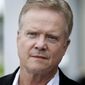 Former Virginia Sen. Jim Webb talks with employees of the Rippey Wind Farm in Grand Junction, Iowa, during a tour on June 15, 2015. (Associated Press) ** FILE **