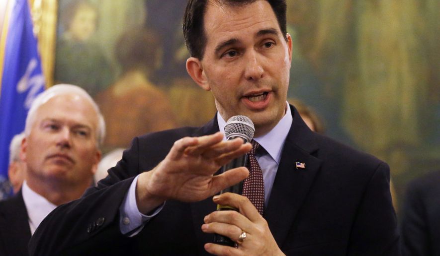 Wisconsin Gov. Scott Walker talks about a deal to pay for a new arena for the Milwaukee Bucks at a news conference in Madison, Wis., on June 4, 2015. (Associated Press) **FILE**