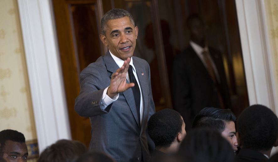 President Barack Obama waves after speaking at a White House mentorship and leadership graduation ceremony , Monday, June 15, 2015, in the Blue Room of the White House in Washington (AP Photo/Evan Vucci)