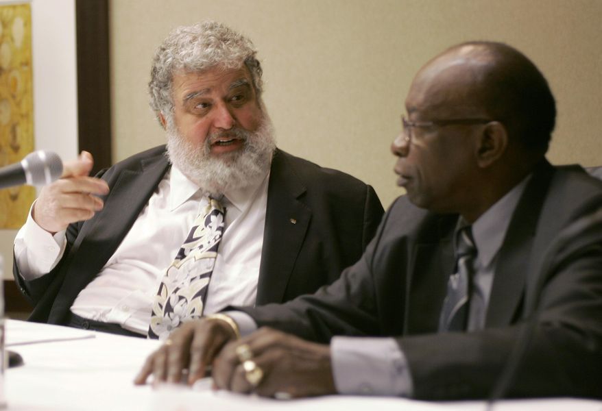 FILE - In this Jan. 28, 2008, CONCACAF General Secretary Chuck Blazer, left, and President Jack Warner chat during a news conference in Miami. Former FIFA executive committee member Blazer agreed to act undercover for U.S. prosecutors and has been cooperating since at least 2011 in the government's investigation of soccer corruption. Blazer's 19-page plea agreement from Nov. 25, 2013, was unsealed Monday, June 15, 2015, after a federal judge agreed to a request by media organizations. As part of the deal, Blazer agreed he would sign over title of his FIFA pension to satisfy payments owed to the U.S. government. (AP Photo/Wilfredo Lee, File)