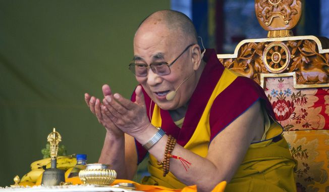 The Dalai Lama, Tibetan spiritual leader, gestures as he talks during a special ritual ceremony at the Tibetan Children&#x27;s Village School in Dharmsala, India, in this Friday, May 29, 2015, file photo. The National Constitution Center CEO Jeffrey Rosen announced Wednesday, June 17, 2015 that the Dalai Lama will be honored with Philadelphia’s Liberty Medal for his efforts to promote compassion and human rights around the globe. (AP Photo/Ashwini Bhatia, File)