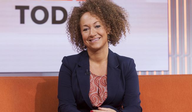 In this image released by NBC News, former NAACP leader Rachel Dolezal appears on the&quot;Today&quot; show set on Tuesday, June 16, 2015, in New York. Ms. Dolezal was born to two parents who say they are white, but she chooses instead to self-identify as black. Her ability to think she has a choice shows a new fluidity in race in a diversifying America, a place where the rigid racial structures that defined most of this country’s history seems, for some, to be falling to the wayside. (Anthony Quintano/NBC News via AP)